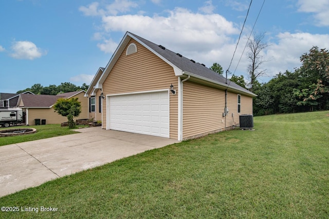 128 Boone Trce, Radcliff, KY 40160 - view of side of home featuring a lawn, concrete driveway, and a garage