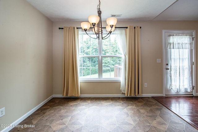 128 Boone Trce, Radcliff, KY 40160 - unfurnished dining area featuring a chandelier and baseboards