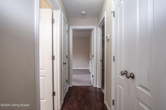 128 Boone Trce, Radcliff, KY 40160 - hall featuring dark wood-style floors and a textured ceiling