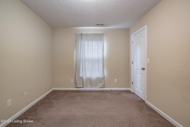 128 Boone Trce, Radcliff, KY 40160 - carpeted empty room with a textured ceiling and baseboards