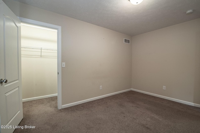 128 Boone Trce, Radcliff, KY 40160 - carpeted empty room with a textured ceiling and a smoke detector