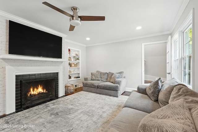 1724 Trevilian Way, Louisville, KY 40205 - living room featuring ceiling fan, a fireplace, built in shelves, wood finished floors, and recessed lighting