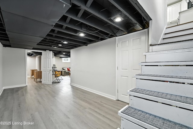 1724 Trevilian Way, Louisville, KY 40205 - finished basement with light wood finished floors and stairway