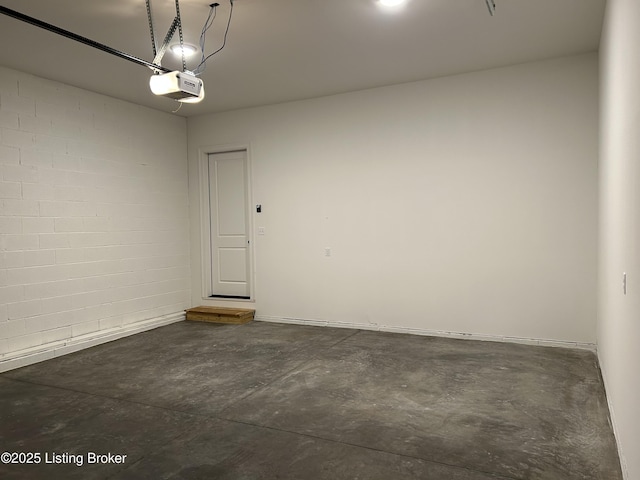 6355 Meeting St Unit 101, 201, Prospect, KY 40059 - garage with a garage door opener and concrete block wall