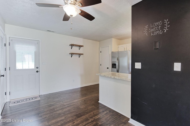6604 Burlwood Dr, Louisville, KY 40229 - kitchen with stainless steel fridge, dark wood-style flooring, a textured ceiling, a ceiling fan, and white cabinets
