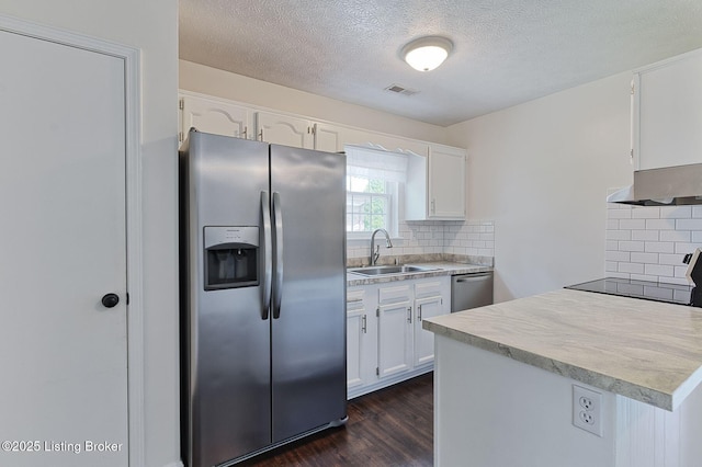 6604 Burlwood Dr, Louisville, KY 40229 - kitchen featuring stainless steel appliances, a textured ceiling, under cabinet range hood, white cabinetry, and dark wood-type flooring