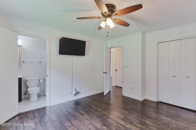 6604 Burlwood Dr, Louisville, KY 40229 - unfurnished bedroom with wood finished floors, ornamental molding, a closet, ensuite bath, and a ceiling fan