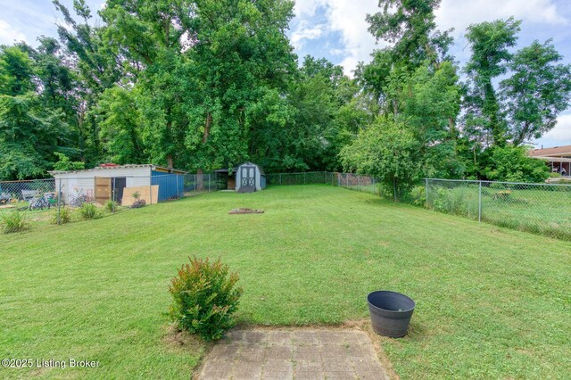 6604 Burlwood Dr, Louisville, KY 40229 - fenced backyard with a storage shed