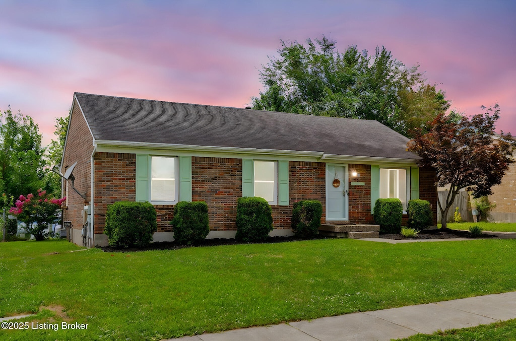 12214 Ridgemont Rd, Shepherdsville, KY 40229 - ranch-style house with a front yard, brick siding, and a shingled roof