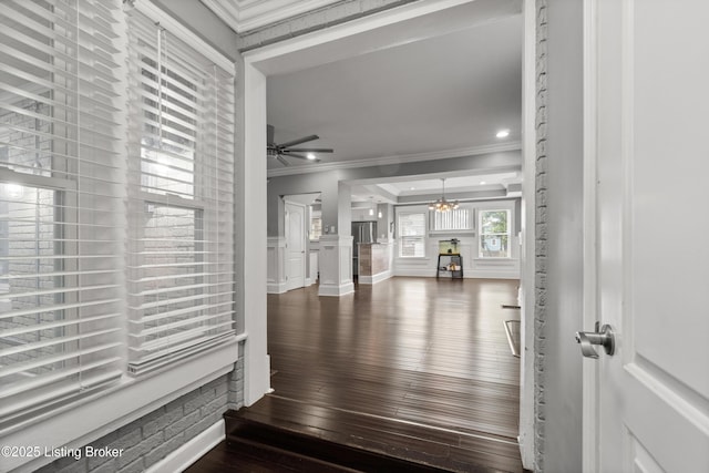 217 Shawnee Dr, Louisville, KY 40212 - stairway featuring ornamental molding, wood-type flooring, ceiling fan, and a chandelier