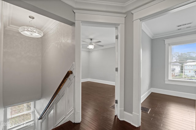 217 Shawnee Dr, Louisville, KY 40212 - hallway featuring an upstairs landing, dark wood finished floors, and crown molding
