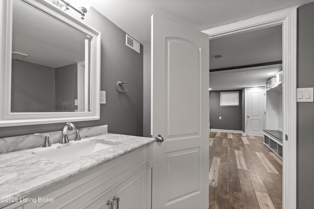 217 Shawnee Dr, Louisville, KY 40212 - bathroom featuring vanity and wood finished floors