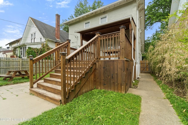 217 Shawnee Dr, Louisville, KY 40212 - rear view of house with stairs, a deck, and a patio area