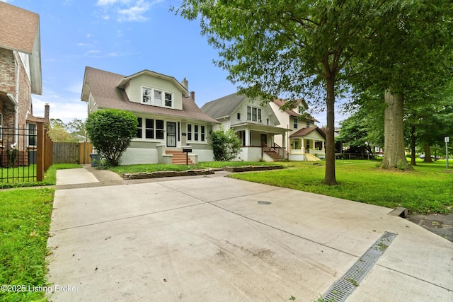 217 Shawnee Dr, Louisville, KY 40212 - view of front of home with a chimney, entry steps, and a shingled roof