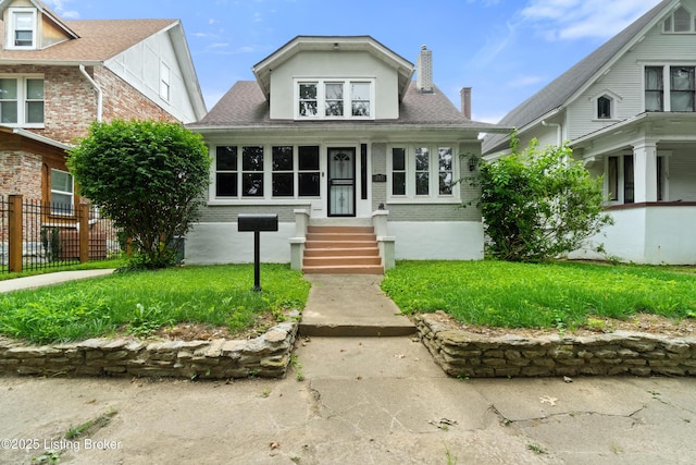 217 Shawnee Dr, Louisville, KY 40212 - bungalow-style home featuring brick siding, a chimney, and entry steps