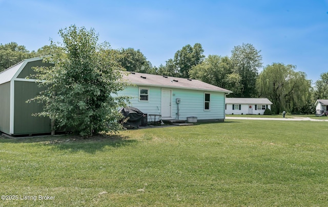 330 W Cardinal Ct, Madison, IN 47250 - back of house featuring a yard