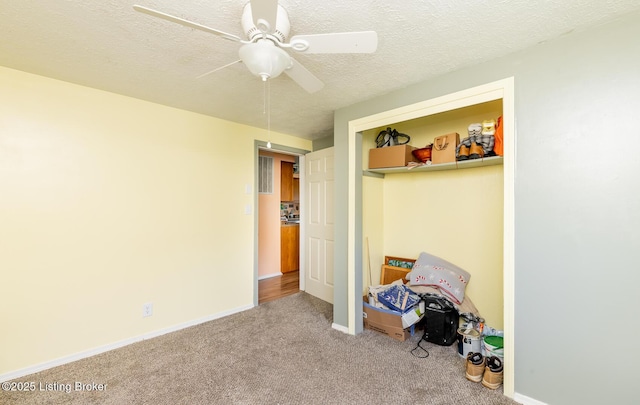 330 W Cardinal Ct, Madison, IN 47250 - unfurnished bedroom featuring carpet floors, a textured ceiling, a ceiling fan, and a closet