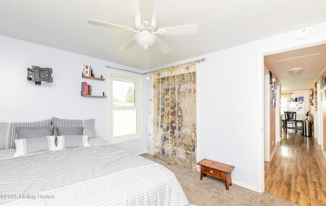 330 W Cardinal Ct, Madison, IN 47250 - bedroom with a ceiling fan, a textured ceiling, and light colored carpet