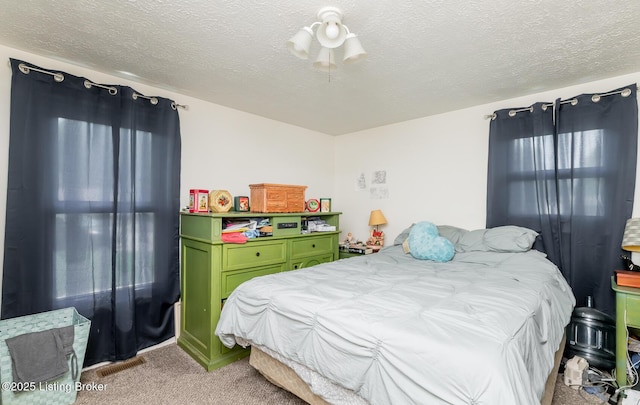 330 W Cardinal Ct, Madison, IN 47250 - carpeted bedroom featuring a textured ceiling