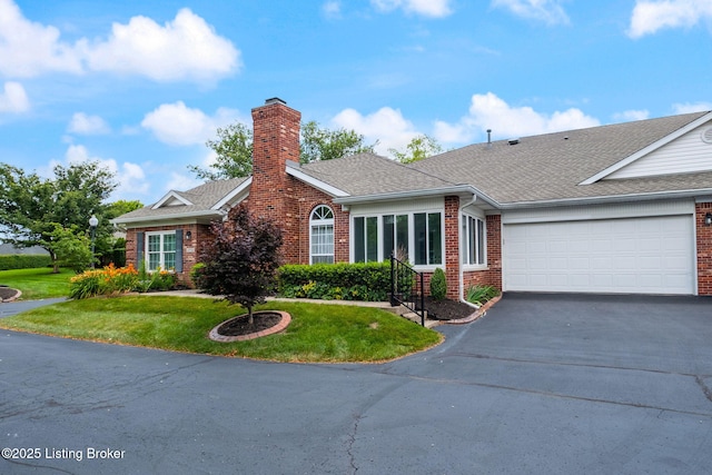 13702 Beowulf Ct, Louisville, KY 40299 - view of front of home featuring brick siding, driveway, an attached garage, a front lawn, and a chimney