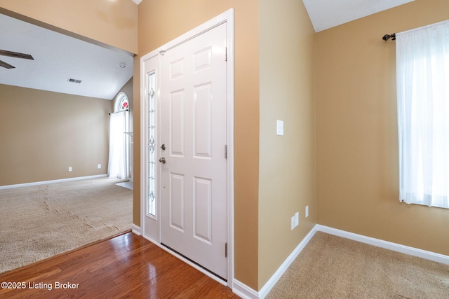 13702 Beowulf Ct, Louisville, KY 40299 - entrance foyer featuring carpet, ceiling fan, vaulted ceiling, and wood finished floors