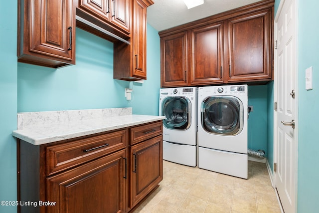 13702 Beowulf Ct, Louisville, KY 40299 - laundry area featuring cabinet space and washer and clothes dryer