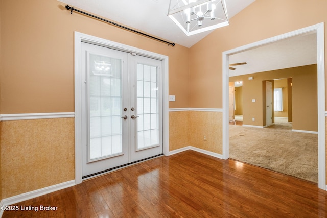 13702 Beowulf Ct, Louisville, KY 40299 - doorway featuring french doors, lofted ceiling, wood finished floors, a chandelier, and plenty of natural light