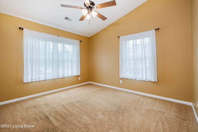 13702 Beowulf Ct, Louisville, KY 40299 - unfurnished room with vaulted ceiling, a ceiling fan, and carpet