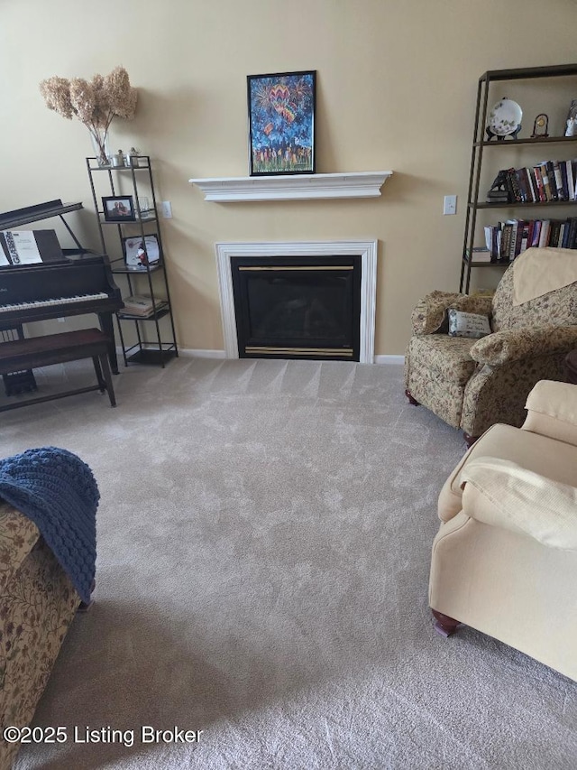 6911 Caitlynn Way, Louisville, KY 40229 - living area featuring a glass covered fireplace and carpet floors