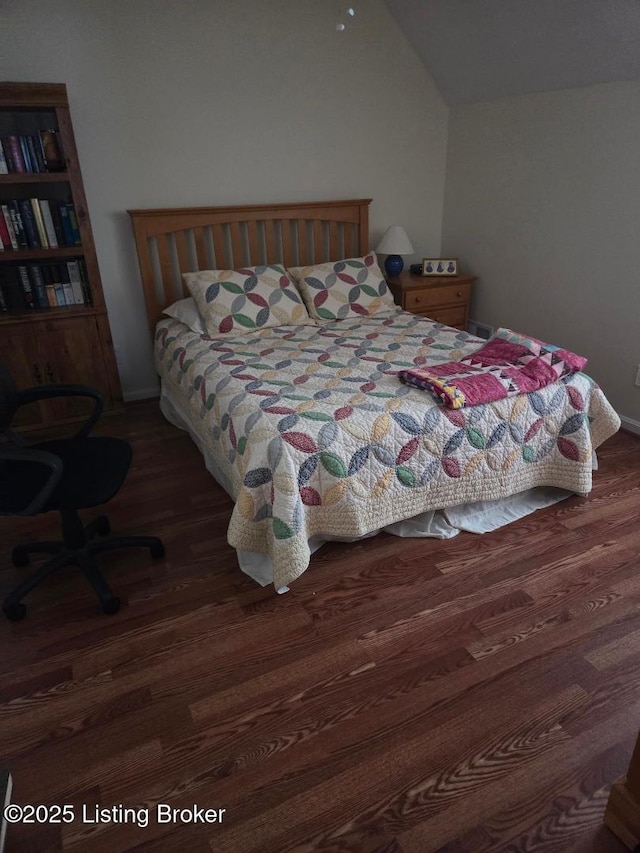 6911 Caitlynn Way, Louisville, KY 40229 - bedroom featuring wood finished floors and vaulted ceiling