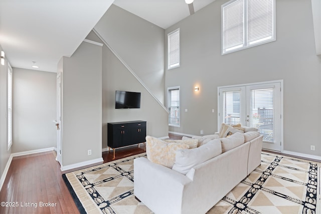 10600 Norton Commons Walk, Prospect, KY 40059 - living room featuring a towering ceiling, light wood-type flooring, and french doors