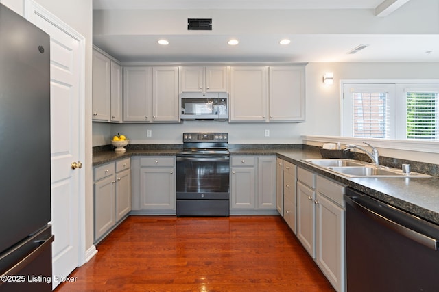 10600 Norton Commons Walk, Prospect, KY 40059 - kitchen featuring appliances with stainless steel finishes, gray cabinets, dark countertops, and recessed lighting