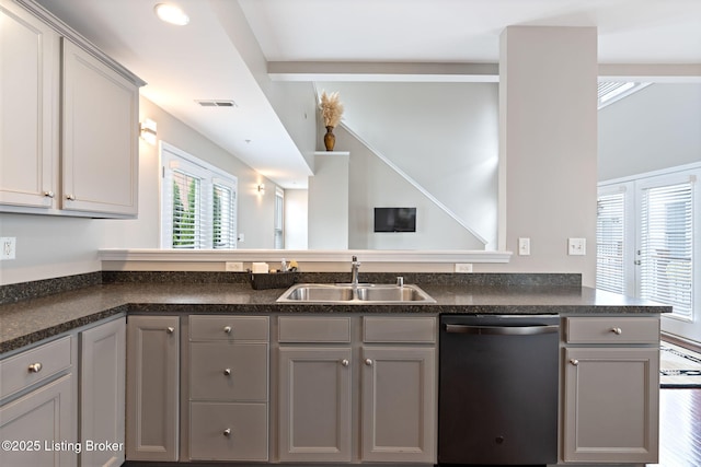 10600 Norton Commons Walk, Prospect, KY 40059 - kitchen featuring stainless steel dishwasher, gray cabinets, dark countertops, and a peninsula