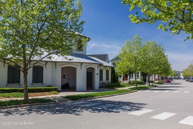 10600 Norton Commons Walk, Prospect, KY 40059 - view of front facade with stucco siding and a metal roof