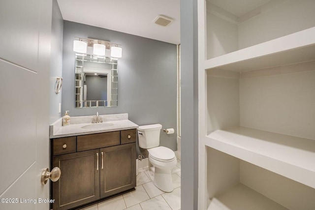 415 E Market St Unit 104, Louisville, KY 40202 - bathroom with vanity and tile patterned flooring