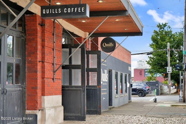 415 E Market St Unit 104, Louisville, KY 40202 - entrance to property with brick siding