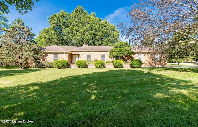 606 N Arbor Dr, Louisville, KY 40223 - single story home featuring a front lawn, brick siding, and a chimney