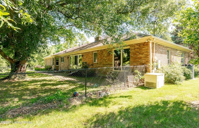 606 N Arbor Dr, Louisville, KY 40223 - view of front of house featuring brick siding and a chimney