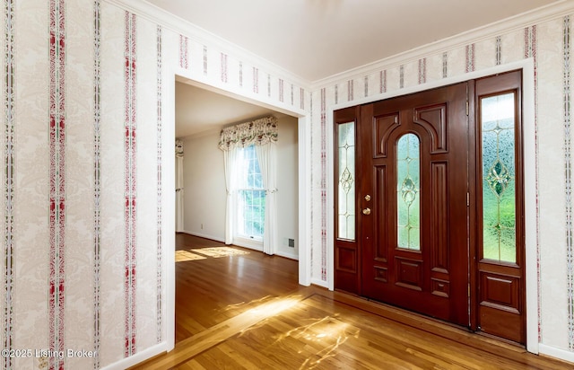 606 N Arbor Dr, Louisville, KY 40223 - foyer featuring crown molding, wood finished floors, and wallpapered walls