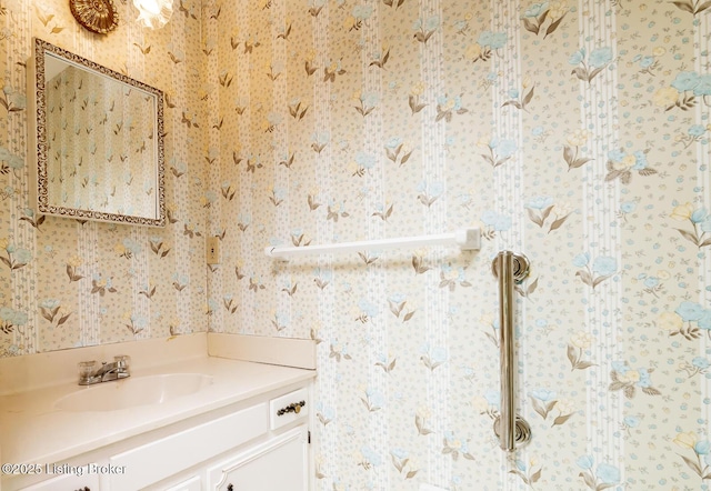 606 N Arbor Dr, Louisville, KY 40223 - bathroom with vanity and wallpapered walls