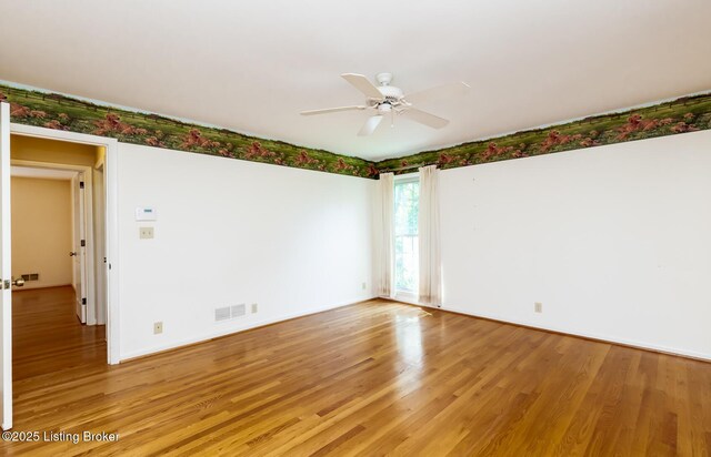 606 N Arbor Dr, Louisville, KY 40223 - empty room with light wood-type flooring and a ceiling fan