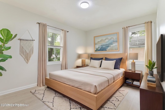 1215 Vim Dr, Louisville, KY 40213 - bedroom with light wood-type flooring and baseboards