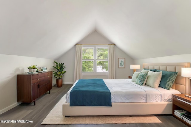 1215 Vim Dr, Louisville, KY 40213 - bedroom featuring wood finished floors and vaulted ceiling