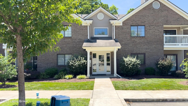 410 Ethridge Ave Unit 103, Louisville, KY 40223 - view of front facade with brick siding and a front yard
