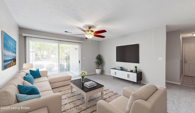 410 Ethridge Ave Unit 103, Louisville, KY 40223 - carpeted living room featuring ceiling fan and baseboards