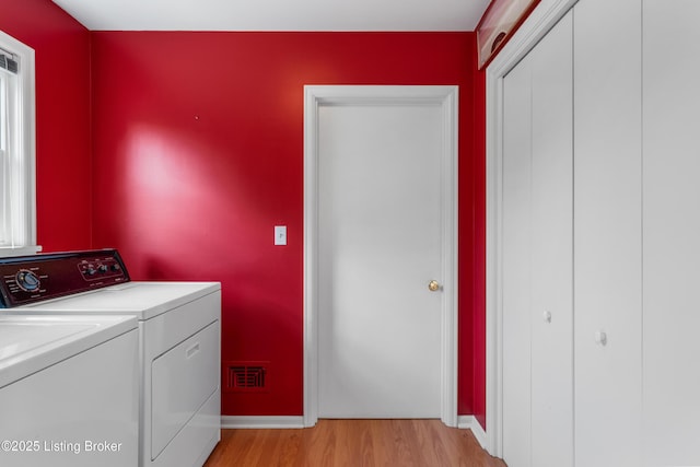 3012 Hayfield Dr, Louisville, KY 40205 - laundry room featuring washer and dryer and light wood-type flooring