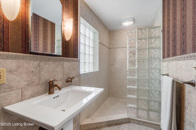 3012 Hayfield Dr, Louisville, KY 40205 - bathroom with tile walls, walk in shower, and wallpapered walls