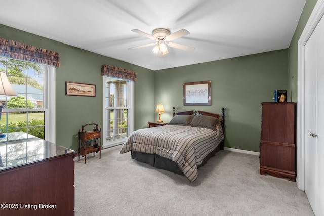 3012 Hayfield Dr, Louisville, KY 40205 - bedroom featuring multiple windows, light carpet, and ceiling fan
