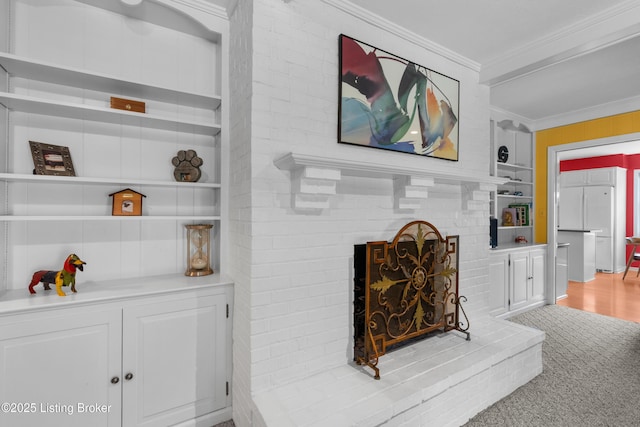 3012 Hayfield Dr, Louisville, KY 40205 - carpeted living area featuring ornamental molding, a brick fireplace, and built in shelves
