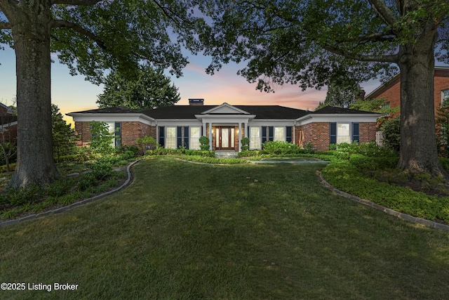 3012 Hayfield Dr, Louisville, KY 40205 - view of front of home with brick siding, a yard, and french doors